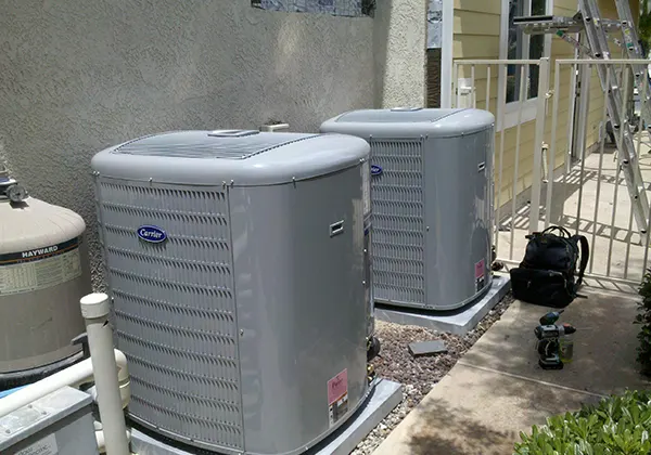 Dual Carrier Outdoor AC Condenser Installation